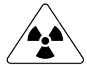 A black and white triangle with a sign
Description automatically generated