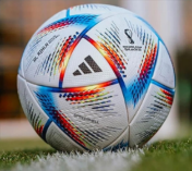 A football ball on the grass

AI-generated content may be incorrect.