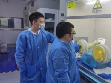 A few men wearing blue scrubs and face masks

AI-generated content may be incorrect.