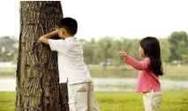 A child and child playing with a tree

AI-generated content may be incorrect.