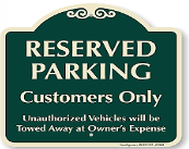 A green and white reserved parking sign

AI-generated content may be incorrect.