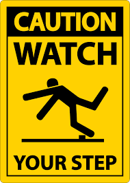 A yellow sign with a black and white sign with a person falling on it

AI-generated content may be incorrect.
